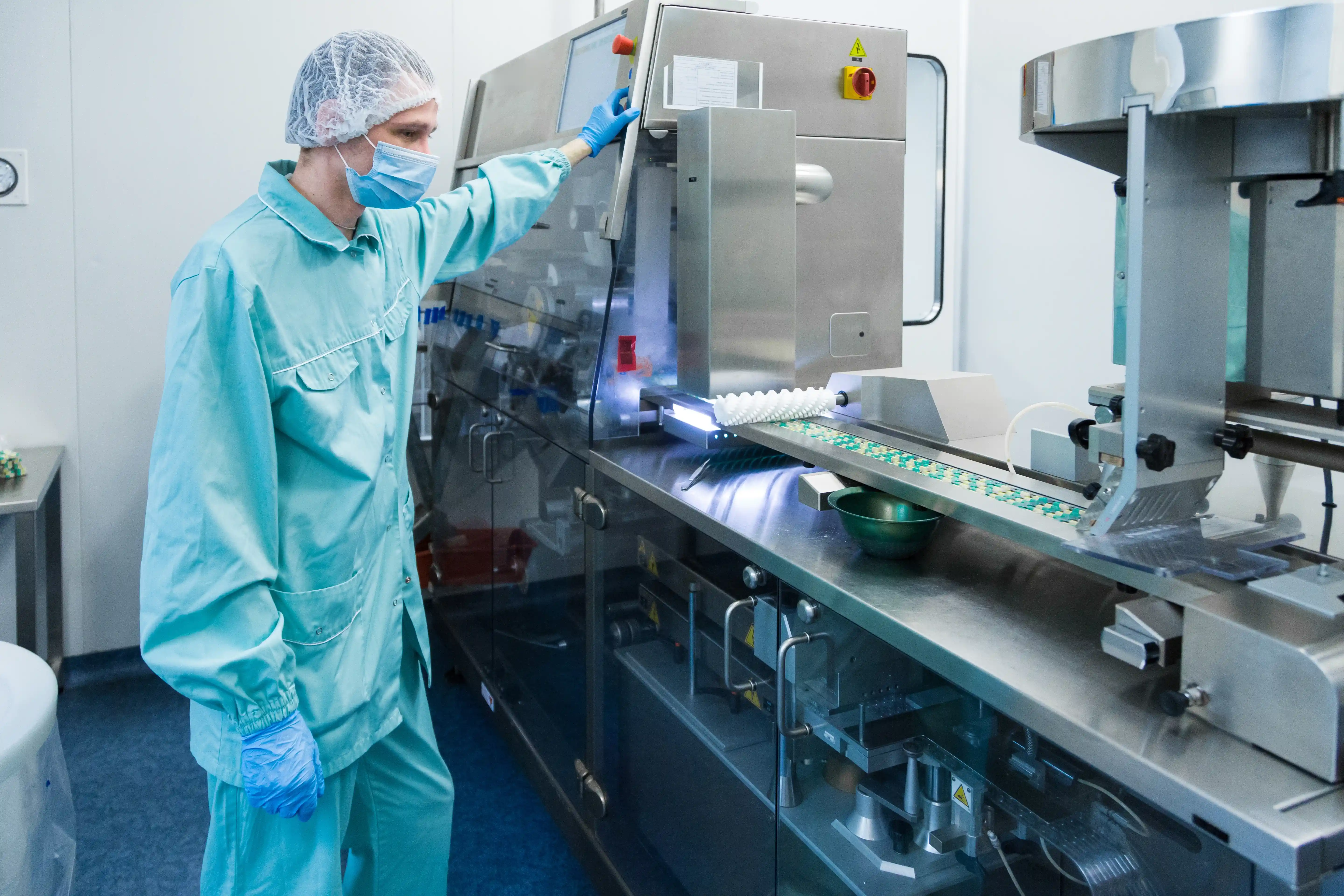 6a2fb145e5461c1b9fd4f66d_pharmaceutical-industry-man-work (1).webp