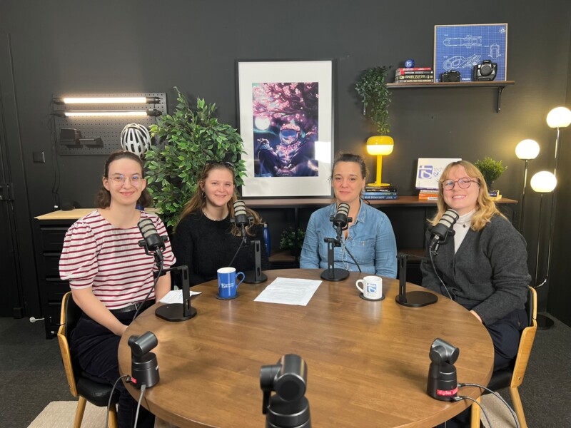 Group photo of Technology and Strategy engineers alongside the podcast host